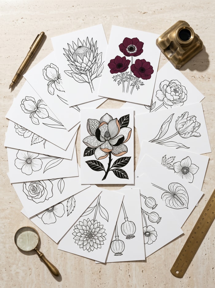 A wreath of ready line-art flower shapes around one patterned magnolia