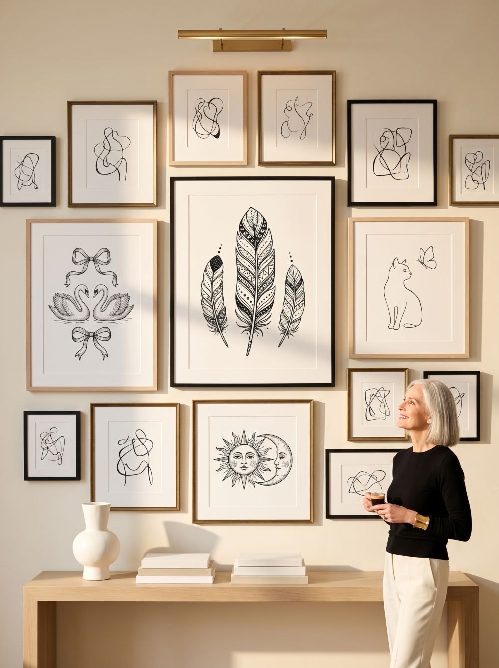 The finished wall — her own drawings, framed, floor to ceiling