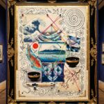 A framed museum panel collaging a great wave, Mount Fuji, a carp and a paper crane with neon threads and one-line ink doodles