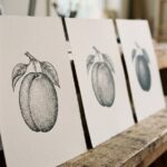 Three sheets of the same stippling drawing propped in a receding row, the dots merging into smooth shadow with distance